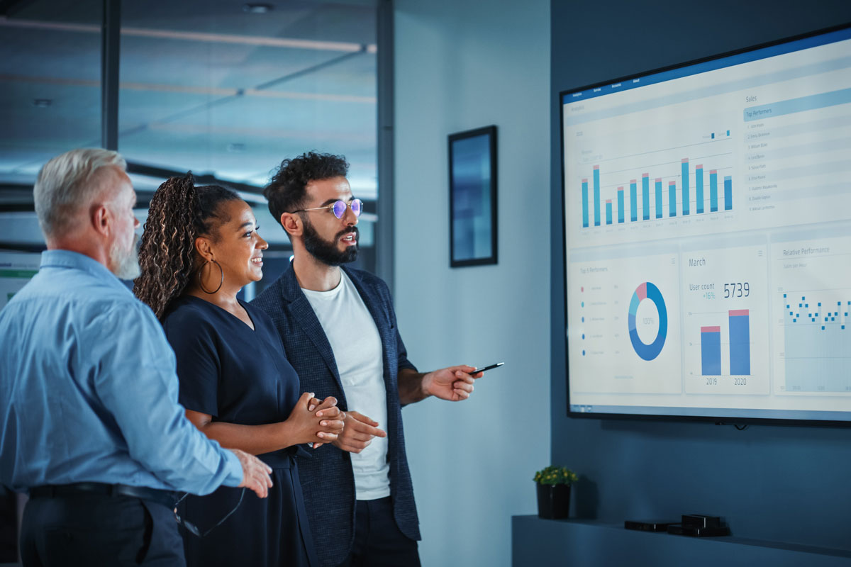 Photo of a logistics team reviewing analytics data